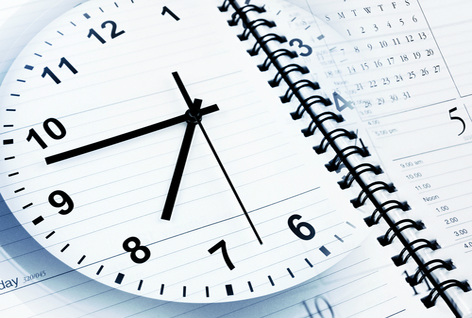 An image of a clock overlayed on a planner