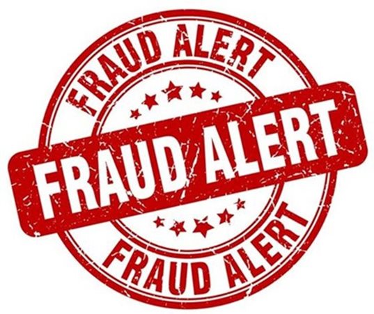 An image that looks like a stamp with the words "Fraud Alert"